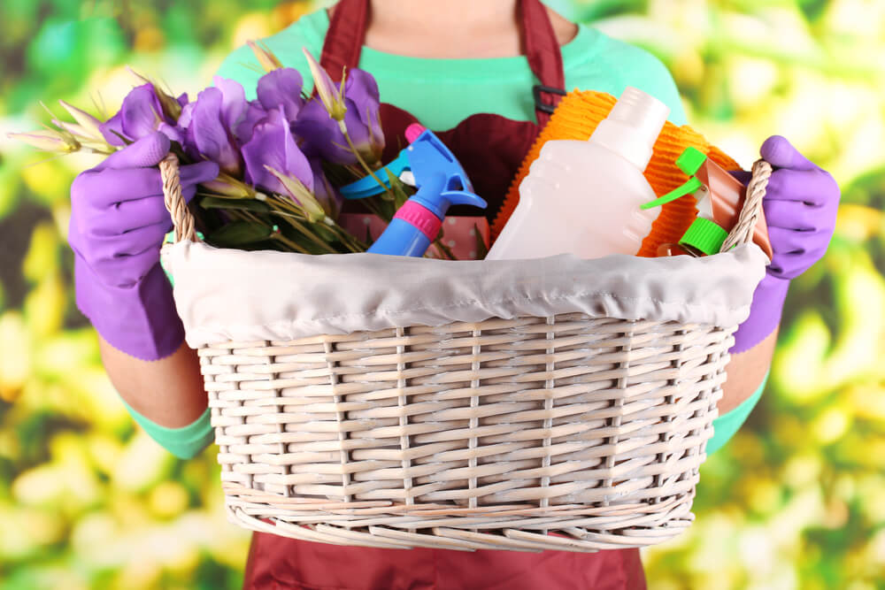 basket with cleaning supplies.