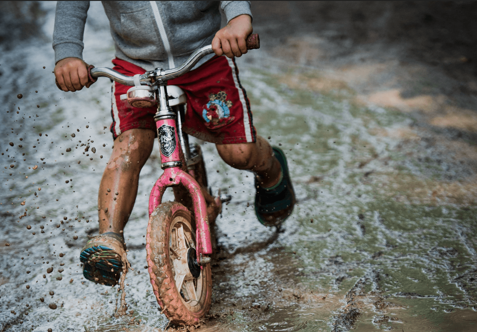 kid with muddy clothes.